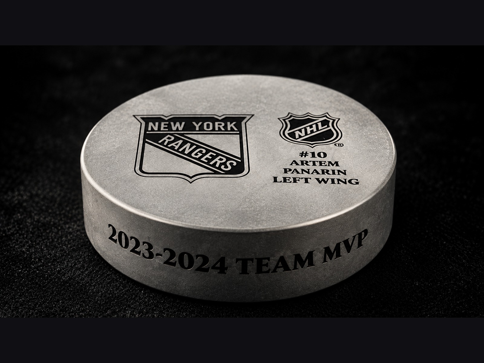 Crystal hockey puck masterfully etched for the New York Rangers